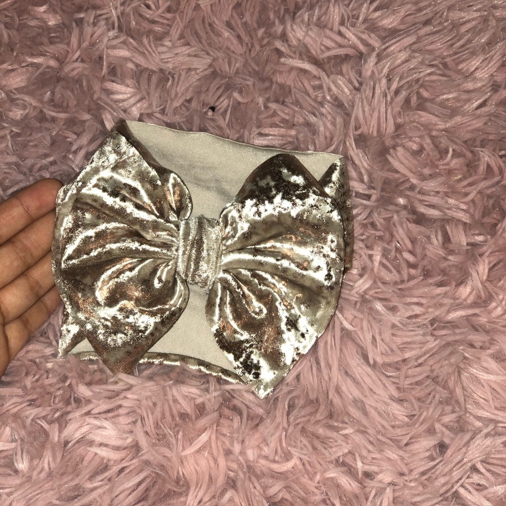 Baby girl rose gold bow